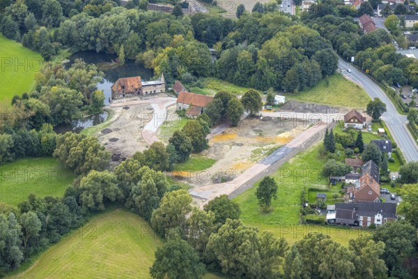 Aerial view, construction site and renovation of the Schlossmühle am Mühlengraben am Mühlenteich in the district Heessen in Hamm, Ruhr area, North Rhine-Westphalia, Germany, construction work, construction area, building site, building plots, construction project, construction site, DE, Europe, Hamm, aerial view, aerial photography, aerial photography, aerial photography, renovation, overview, bird's-eye view, overview