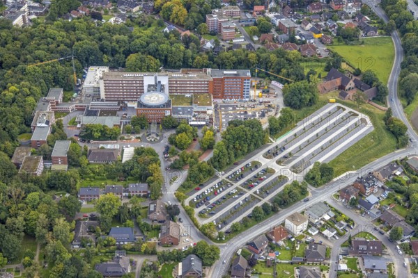 Aerial view, construction site with extension at the St. Barbara Clinic in the district of Heessen in Hamm, Ruhr area, North Rhine-Westphalia, Germany, construction work, construction, construction area, building site, building plots, construction project, construction site, DE, Europe, healthcare, Hamm, hospital, helipad, clinic, clinic centre, hospital, aerial photograph, aerial photography, aerial photography, medical facility, medical aid, new building, car park, overview, bird's eye view, bird's eye view, overview, medical care