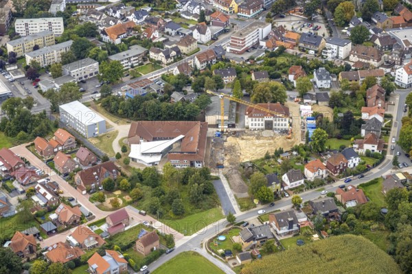 Aerial view, construction site with extension of the Falkschule / Arnold-Freymuth-Gesamtschule in the district Herringen in Hamm, Ruhr area, North Rhine-Westphalia, Germany, construction work, construction area, building site, building plots, construction measure, construction project, construction site, education, educational institution, DE, Europe, Hamm, educational institute, aerial view, aerial photography, aerial photography, school, overview, bird's-eye view, overview