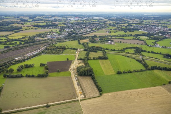Aerial view, construction site for wind turbines between Kamener Straße and Rathenaustraße in the district Pelkum in Hamm, Ruhr area, North Rhine-Westphalia, Germany, construction work, construction area, construction site, building plot, construction project, construction site, DE, Europe, Hamm, aerial view, aerial photography, aerial photography, overview, bird's eye view, WEA, wind energy, wind turbine, wind power, wind power plant, wind turbines, birds-eyes view, overview