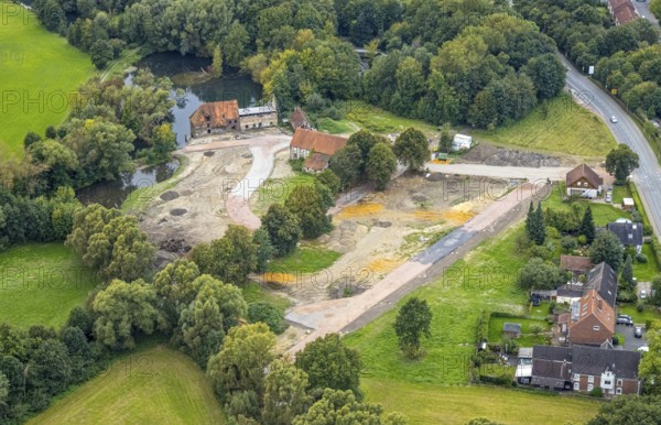Aerial view, construction site and renovation of the Schlossmühle am Mühlengraben am Mühlenteich in the district Heessen in Hamm, Ruhr area, North Rhine-Westphalia, Germany, construction work, construction area, building site, building plots, construction project, construction site, DE, Europe, Hamm, aerial view, aerial photography, aerial photography, aerial photography, renovation, overview, bird's-eye view, overview
