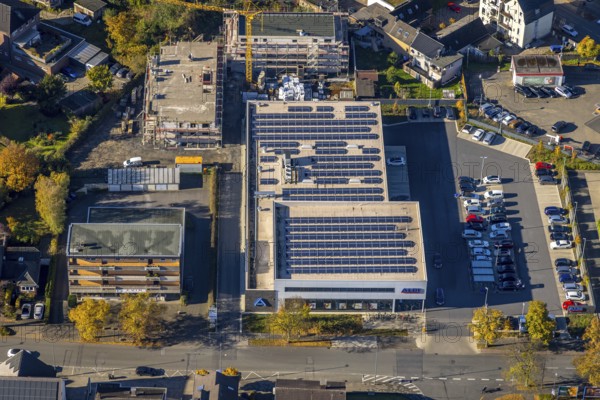 Aerial view, construction site and new building Heessener Gärten at the Aldi supermarket with solar roof Kleine Amtsstraße in the district Heessen in Hamm, Ruhr area, North Rhine-Westphalia, Germany, DE, shopping markets, shopping centre, Europe, Hamm, aerial view, aerial photography, aerial photography, metropolitan region Rhine-Ruhr, local supply centre, photovoltaic, photovoltaic system, solar, solar system, solar roof, solar energy, supermarket, overview, bird's eye view, birds-eyes view, overview