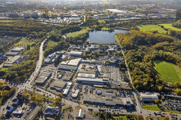 Aerial view, commercial area Hüserstraße at Radbodsee in the district Bockum-Hövel in Hamm, Ruhr area, North Rhine-Westphalia, Germany, DE, Europe, commercial enterprises, commercial area, commercial park, commercial location, commercial use, Hamm, industrial area, industrial building, industrial location, aerial view, aerial photography, aerial photography, lake, overview, bird's eye view, birds-eyes view, overview