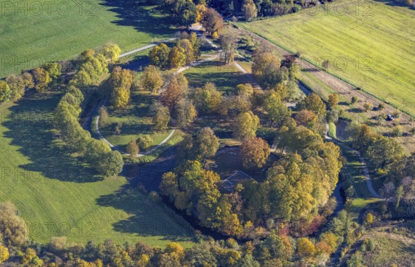 Aerial view, Burghügel Mark surrounded by moats in the district Uentrop in Hamm, Ruhr area, North Rhine-Westphalia, Germany, ground monument, castle, Burg Mark, Burgplatz, DE, Europe, moat, green trees, Hamm, autumn colours, aerial view, aerial photography, aerial photography, Marker Burghügel, local recreation area, sight, Soester Straße, overview, bird's-eye view, birds-eyes view, historical, medieval fortification, overview