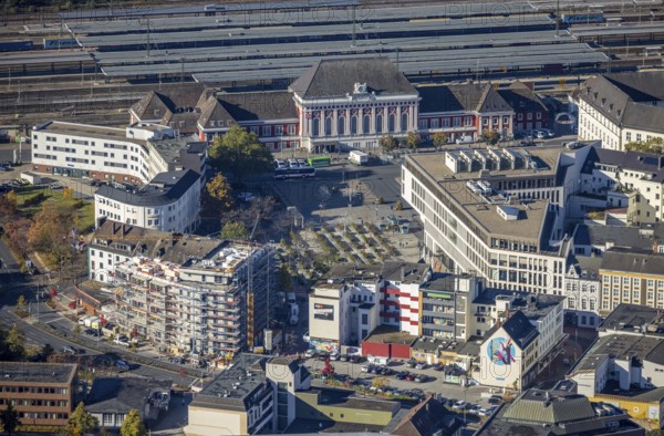 Aerial view, Hamm main station with city centre and construction site with new building at Willy-Brandt-Platz at Bahnhofstraße in the district Mitte in Hamm, Ruhr area, North Rhine-Westphalia, Germany, railway tracks, station, station forecourt, platform, construction work, construction area, building site, building plots, construction measure, construction project, construction site, DE, Deutsche Bahn AG, Europe, Hamm, main station, main station, aerial view, aerial photography, aerial photography, new building, overview, bird's eye view, bird's eye view, overview