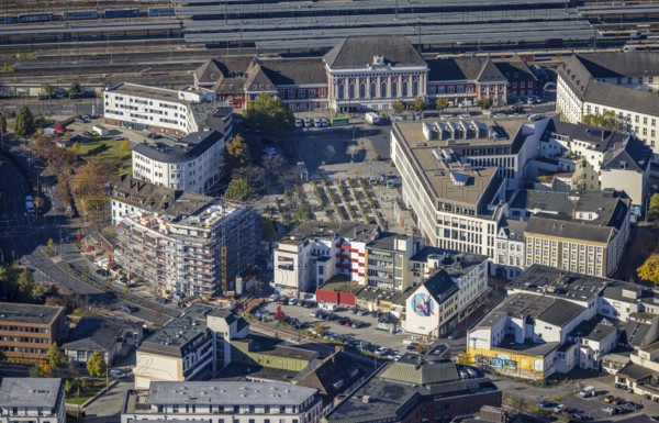 Aerial view, Hamm main station with city centre and construction site with new building at Willy-Brandt-Platz at Bahnhofstraße in the district Mitte in Hamm, Ruhr area, North Rhine-Westphalia, Germany, railway tracks, station, station forecourt, platform, construction work, construction area, building site, building plots, construction measure, construction project, construction site, DE, Deutsche Bahn AG, Europe, Hamm, main station, main station, aerial view, aerial photography, aerial photography, new building, overview, bird's eye view, bird's eye view, overview
