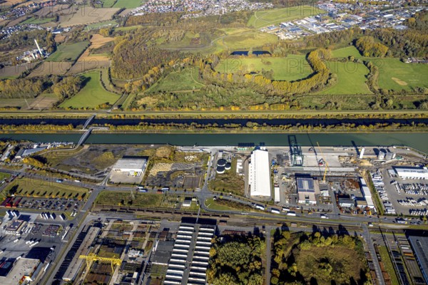 Aerial view, Lanfer Logistik and Maxi Terminal in the harbour and Radbod slagheap with Radbod slagheap sign and Alte Lippe in the district of Herringen in Hamm, Ruhr area, North Rhine-Westphalia, Germany, DE, Datteln-Hamm Canal, Europe, River Lippe, commercial enterprises, commercial area, commercial site, commercial use, harbour area, harbour road, Hamm, industrial area, industrial building, industrial site, aerial view, aerial photography, aerial photography, overview, bird's-eye view, bird's-eye view, overview