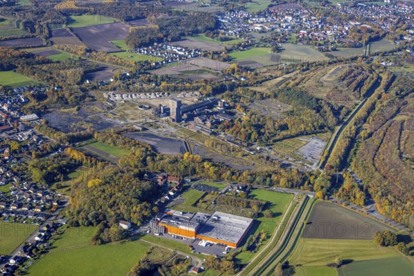 Aerial view, CreativRevier Hamm at the former Ost Zeche Heinrich Robert colliery with hammerhead tower in the Pelkum district of Hamm, Ruhr area, North Rhine-Westphalia, Germany, mine, Heinrich Robert colliery, DE, Europe, commercial enterprises, commercial area, commercial park, commercial location, commercial use, Hamm, industrial facilities, industrial area, industrial building, industrial site, aerial view, aerial photography, aerial photography, coal mine, tower, overview, bird's-eye view, birds-eyes view, former Ost colliery, historical, historical site, overview, destroyed building