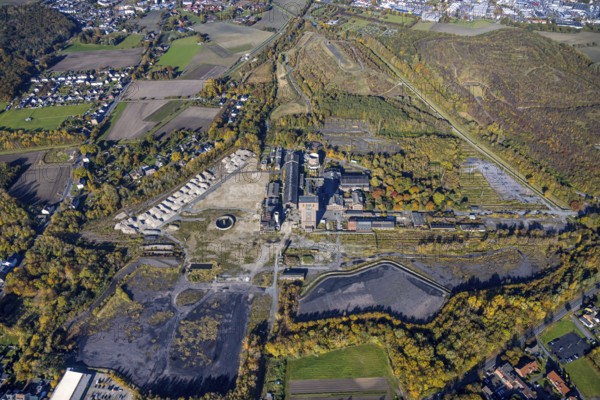 Aerial view, CreativRevier Hamm at the former Ost Zeche Heinrich Robert colliery with hammerhead tower in the Pelkum district of Hamm, Ruhr area, North Rhine-Westphalia, Germany, mine, Heinrich Robert colliery, DE, Europe, commercial enterprises, commercial area, commercial park, commercial location, commercial use, Hamm, industrial facilities, industrial area, industrial building, industrial site, aerial view, aerial photography, aerial photography, coal mine, tower, overview, bird's-eye view, birds-eyes view, former Ost colliery, historical, historical site, overview, destroyed building