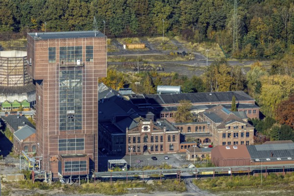 Aerial view, CreativRevier Hamm at the former Ost Zeche Heinrich Robert colliery with hammerhead tower in the Pelkum district of Hamm, Ruhr area, North Rhine-Westphalia, Germany, mine, Heinrich Robert colliery, DE, Europe, commercial enterprises, commercial area, commercial park, commercial location, commercial use, Hamm, industrial facilities, industrial area, industrial building, industrial site, aerial view, aerial photography, aerial photography, coal mine, tower, overview, bird's-eye view, birds-eyes view, former Ost colliery, historical, historical site, overview, destroyed building