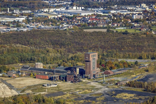 Aerial view, CreativRevier Hamm at the former Ost Zeche Heinrich Robert colliery with hammerhead tower in the Pelkum district of Hamm, Ruhr area, North Rhine-Westphalia, Germany, mine, Heinrich Robert colliery, DE, Europe, commercial enterprises, commercial area, commercial park, commercial location, commercial use, Hamm, industrial facilities, industrial area, industrial building, industrial site, aerial view, aerial photography, aerial photography, coal mine, tower, overview, bird's-eye view, birds-eyes view, former Ost colliery, historical, historical site, overview, destroyed building