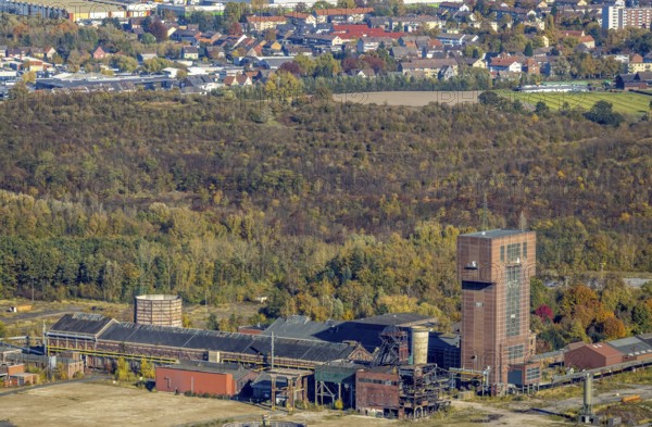 Aerial view, CreativRevier Hamm at the former Ost Zeche Heinrich Robert colliery with hammerhead tower in the Pelkum district of Hamm, Ruhr area, North Rhine-Westphalia, Germany, mine, Heinrich Robert colliery, DE, Europe, commercial enterprises, commercial area, commercial park, commercial location, commercial use, Hamm, industrial facilities, industrial area, industrial building, industrial site, aerial view, aerial photography, aerial photography, coal mine, tower, overview, bird's-eye view, birds-eyes view, former Ost colliery, historical, historical site, overview, destroyed building