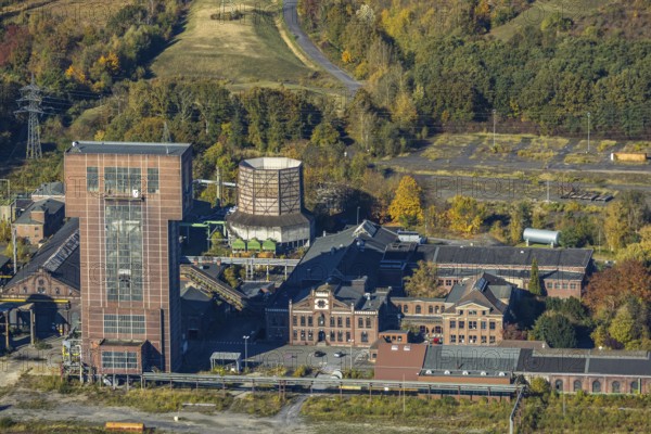 Aerial view, CreativRevier Hamm at the former Ost Zeche Heinrich Robert colliery with hammerhead tower in the Pelkum district of Hamm, Ruhr area, North Rhine-Westphalia, Germany, mine, Heinrich Robert colliery, DE, Europe, commercial enterprises, commercial area, commercial park, commercial location, commercial use, Hamm, industrial facilities, industrial area, industrial building, industrial site, aerial view, aerial photography, aerial photography, coal mine, tower, overview, bird's-eye view, birds-eyes view, former Ost colliery, historical, historical site, overview, destroyed building