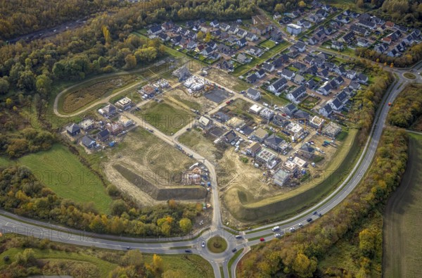 Aerial view, construction area Heimshof Ost at Sachsenring in the district Heessen in Hamm, Ruhr area, North Rhine-Westphalia, Germany, construction work, construction, construction area, construction site, building plots, construction project, construction site, DE, Europe, property tax, Hamm, real estate, roundabout, roundabout, aerial view, aerial photography, aerial photography, new construction, overview, bird's eye view, residential complex, living and living, residential area, residential buildings, residential quality, residential neighbourhood, residential estate, birds-eyes view, overview