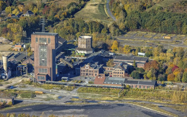 Aerial view, CreativRevier Hamm at the former Ost Zeche Heinrich Robert colliery with hammerhead tower in the Pelkum district of Hamm, Ruhr area, North Rhine-Westphalia, Germany, mine, Heinrich Robert colliery, DE, Europe, commercial enterprises, commercial area, commercial park, commercial location, commercial use, Hamm, industrial facilities, industrial area, industrial building, industrial site, aerial view, aerial photography, aerial photography, coal mine, tower, overview, bird's-eye view, birds-eyes view, former Ost colliery, historical, historical site, overview, destroyed building