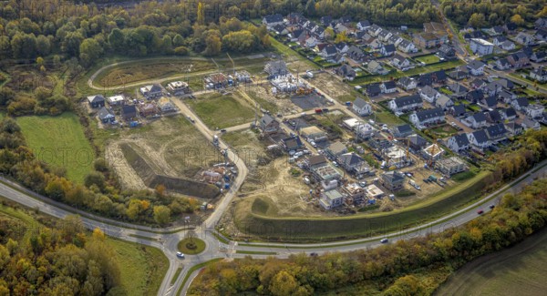Aerial view, construction area Heimshof Ost at Sachsenring in the district Heessen in Hamm, Ruhr area, North Rhine-Westphalia, Germany, construction work, construction, construction area, construction site, building plots, construction project, construction site, DE, Europe, property tax, Hamm, real estate, roundabout, roundabout, aerial view, aerial photography, aerial photography, new construction, overview, bird's eye view, residential complex, living and living, residential area, residential buildings, residential quality, residential neighbourhood, residential estate, birds-eyes view, overview