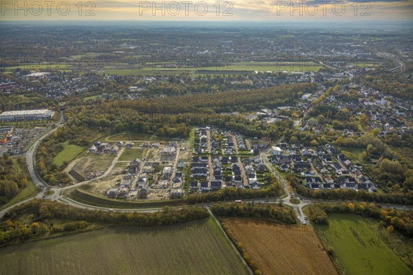 Aerial view, construction area Heimshof Ost at Sachsenring in the district Heessen in Hamm, Ruhr area, North Rhine-Westphalia, Germany, construction work, construction, construction area, construction site, building plots, construction project, construction site, DE, Europe, property tax, Hamm, real estate, roundabout, roundabout, aerial view, aerial photography, aerial photography, new construction, overview, bird's eye view, residential complex, living and living, residential area, residential buildings, residential quality, residential neighbourhood, residential estate, birds-eyes view, overview