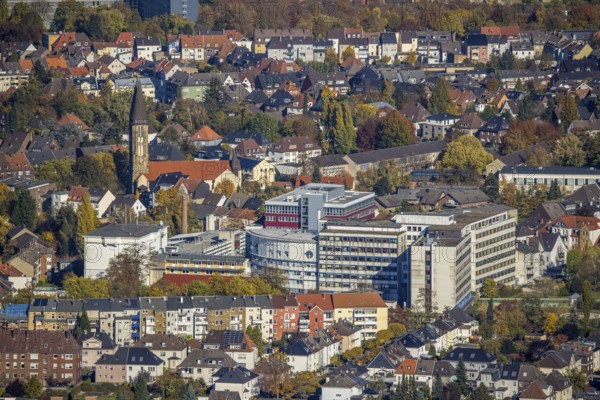 Aerial view, city centre view with Hamm Protestant Hospital and parish of St. Franziskus von Assisi Church of Our Dear Lady in the district of Rhynern in Hamm, Ruhr area, North Rhine-Westphalia, Germany, place of worship, DE, Europe, health care, religious community, place of worship, Hamm, holy place, hospital, church, parish, clinic, clinic centre, denomination, hospital, aerial view, aerial photography, aerial photography, medical facility, medical aid, religion, religious site, overview, bird's eye view, birds-eyes view, overview, medical care
