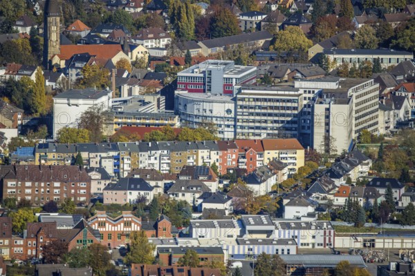 Aerial view, city centre view with Hamm Protestant Hospital and parish of St. Franziskus von Assisi Church of Our Dear Lady in the district of Rhynern in Hamm, Ruhr area, North Rhine-Westphalia, Germany, place of worship, DE, Europe, health care, religious community, place of worship, Hamm, holy place, hospital, church, parish, clinic, clinic centre, denomination, hospital, aerial view, aerial photography, aerial photography, medical facility, medical aid, religion, religious site, overview, bird's eye view, birds-eyes view, overview, medical care
