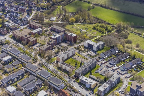 Aerial view, Rheinsberger Platz with high-rise housing estate, urban gardening in the Kornmersch, Bockum-Hövel, Hamm, Ruhr area, North Rhine-Westphalia, Germany, flower field, DE, Europe, community garden, aerial view, aerial photography, aerial photography, overview, urban garden, urban gardening, bird's eye view, living and living, residential area, housing estate, birds-eyes view, overview, sowing, cultivating and harvesting in your own bed