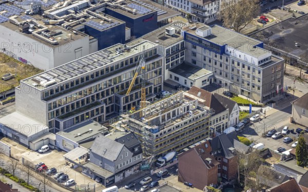 Aerial photo, Widumstraße construction site for new WA office building, Westfälischer Anzeiger, Radio Lippewelle Hamm in construction site, centre, Hamm, Ruhr area, North Rhine-Westphalia, Germany, construction work, construction, construction area, building site, building plots, construction project, construction site, DE, Europe, commercial enterprises, commercial area, commercial area, commercial site, commercial use, industrial building, industrial site, aerial view, aerial photography, aerial photography, new building, photovoltaic, photovoltaic plant, solar, solar plant, solar energy, solar energy, Stadtanzeiger Hamm, overview, bird's-eye view, newspaper publisher, birds-eyes view, overview