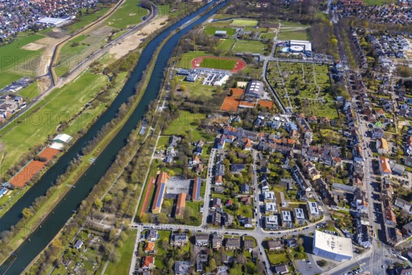 Aerial view, Maximare Erlebnistherme Bad Hamm, Sports Centre Hamm-Ost with Jahnstadion, Theodor-Heuss-School, Municipal Music School Hamm, River Lippe and Datteln-Hamm Canal, Centre, Hamm, Ruhr Area, North Rhine-Westphalia, Germany, Arthur-Dewitz-Straße, Burial site, Care and nursing, Education, Educational institution, DE, Adventure pool, Europe, Cemetery, Football pitch, Football stadium, Healthcare, Gottesacker, graves, cemetery, teaching institute, aerial view, aerial photography, aerial photography, medical facility, medical aid, eastern cemetery, care facility, rehabilitation centre, resting place, school, sport, sports facilities, sports field, sports facility, tennis, tennis facility, tennis courts, overview, bird's-eye view, overview, reha Bad Hamm, medical care