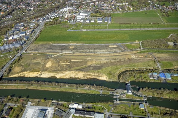 Aerial view, construction area at Jupp-Eickhoff-Weg with river Lippe and Datteln-Hamm canal, Hamm airfield, Heessen, Hamm, Ruhr area, North Rhine-Westphalia, Germany, construction area, construction site, building plots, construction project, DE, Europe, flight emission, aircraft noise, airfield, runway, aerial photograph, aerial photography, aerial photography, runway, overview, bird's-eye view, overview