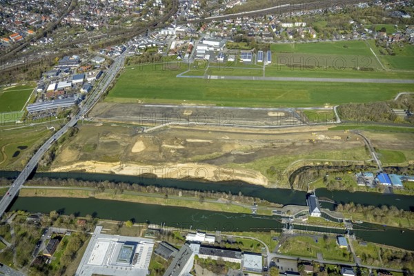 Aerial view, construction area at Jupp-Eickhoff-Weg with river Lippe and Datteln-Hamm canal, Hamm airfield, Heessen, Hamm, Ruhr area, North Rhine-Westphalia, Germany, construction area, construction site, building plots, construction project, DE, Europe, flight emission, aircraft noise, airfield, runway, aerial photograph, aerial photography, aerial photography, runway, overview, bird's-eye view, overview