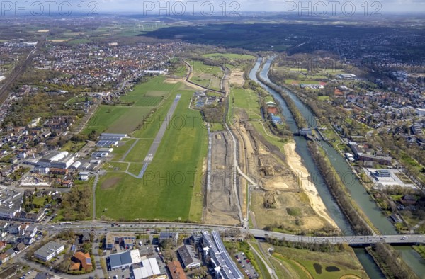 Aerial view, construction area at Jupp-Eickhoff-Weg with river Lippe and Datteln-Hamm canal, Hamm airfield, Heessen, Hamm, Ruhr area, North Rhine-Westphalia, Germany, construction area, construction site, building plots, construction project, DE, Europe, flight emission, aircraft noise, airfield, runway, aerial photograph, aerial photography, aerial photography, runway, overview, bird's-eye view, overview