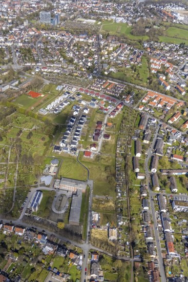 Aerial view, commercial area Am Hülsenbusch with new development area Am Beisenkamp, centre, Hamm, Ruhr area, North Rhine-Westphalia, Germany, DE, Europe, commercial enterprises, commercial area, commercial location, commercial use, property tax, real estate, industrial area, industrial building, industrial site, aerial view, aerial photography, aerial photography, photovoltaic, photovoltaic plant, solar, solar plant, solar energy, solar energy, Nettebrock mourning hall, overview, bird's-eye view, residential complex, living and life, residential area, residential buildings, quality of life, birds-eyes view, overview