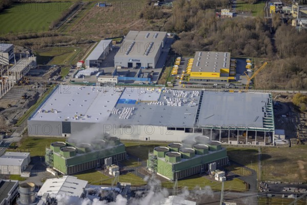 Aerial view, construction site and new building in DistributionPark Hamm, Trianelstraße, K'Park-Straße, Uentrop, Hamm, Ruhr area, North Rhine-Westphalia, Germany, construction work, construction area, building site, building plots, construction project, construction site, DE, DHL, Europe, commercial enterprises, commercial space, commercial area, commercial park, commercial location, commercial use, real estate developer Hines, industrial area, industrial building, industrial location, logistics, logistics provider, logistics centre, aerial view, aerial photography, aerial photography, new construction, overview, bird's-eye view, overview
