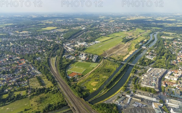 Aerial view, Hamm-Lippewiesen airfield, Lippe floodplain, Hamm lock, Lippe river, Datteln-Hamm canal, construction site for protective dam at Jupp-Eickhoff-Weg, Lippe beach, Heessen, Hamm, Ruhr area, North Rhine-Westphalia, Germany, Allee-Center Hamm, railway tracks, construction work, construction area, construction site, construction project, construction project, construction site, DE, shopping centre, shopping place, shopping mall, Europe, flight emission, airport, aircraft noise, airfield, runway, aerial view, aerial photography, aerial photography, North Rhine-Westphalia, shopping centre, runway, overview, bird's-eye view, overview