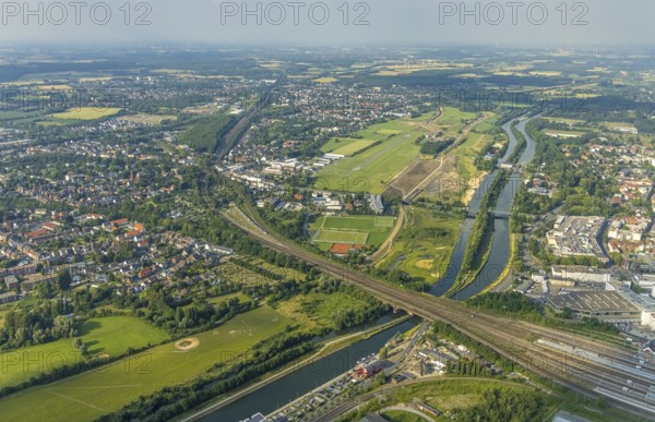 Aerial view, Hamm-Lippewiesen airfield, Lippe floodplain, Hamm lock, Lippe river, Datteln-Hamm canal, construction site for protective dam at Jupp-Eickhoff-Weg, Lippe beach, Heessen, Hamm, Ruhr area, North Rhine-Westphalia, Germany, Allee-Center Hamm, railway tracks, construction work, construction area, construction site, construction project, construction project, construction site, DE, shopping centre, shopping place, shopping mall, Europe, flight emission, airport, aircraft noise, airfield, runway, aerial view, aerial photography, aerial photography, North Rhine-Westphalia, shopping centre, runway, overview, bird's-eye view, overview