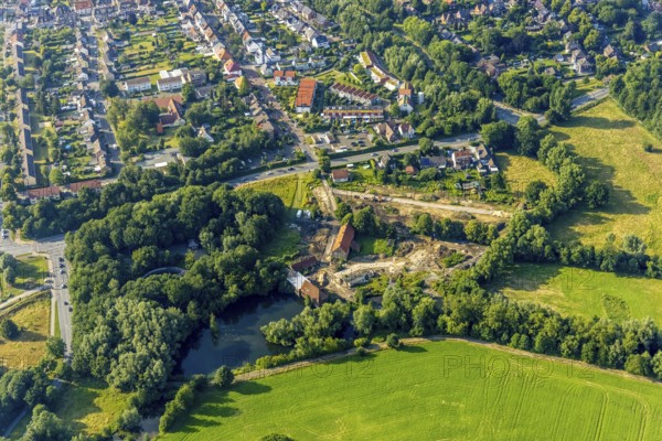 Aerial view, construction site for housing at the Schlossmühle am Mühlenteich, Heessen, Hamm, Ruhr area, North Rhine-Westphalia, Germany, demolition work, construction work, construction area, building site, building plots, construction project, construction site, DE, Europe, aerial view, aerial photography, aerial photography, overview, bird's-eye view, overview