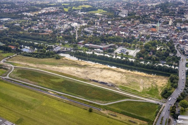 Aerial view, Hamm airfield and construction site for the Lippe floodplain experience project on the River Lippe and Datteln-Hamm Canal in the Heessen district of Hamm, Ruhr area, North Rhine-Westphalia, Germany, construction work, construction area, construction site, building plots, construction project, construction site, DE, Europe, airfield, Hamm, runway, aerial view, aerial photography, aerial photography, runway, overview, bird's-eye view, overview