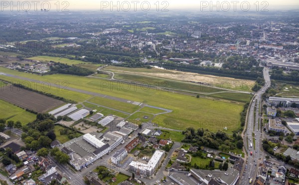 Aerial view, Hamm airfield and construction site for the Lippe floodplain experience project on the River Lippe and Datteln-Hamm Canal in the Heessen district of Hamm, Ruhr area, North Rhine-Westphalia, Germany, construction work, construction area, construction site, building plots, construction project, construction site, DE, Europe, airfield, Hamm, runway, aerial view, aerial photography, aerial photography, runway, overview, bird's-eye view, overview