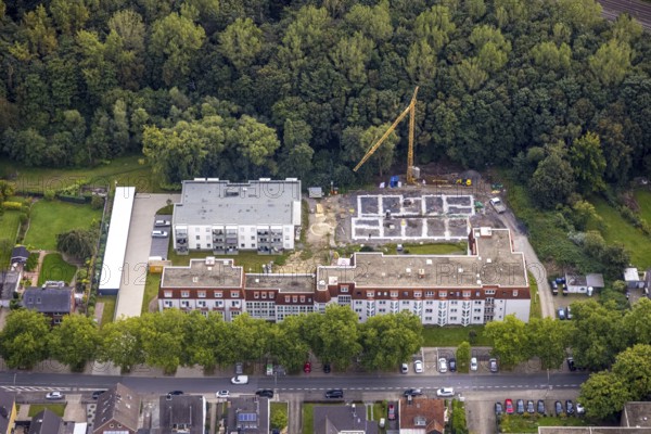Aerial view, construction site at Wolfgang-Glaubitz-Seniorenzentrum am Westberger Weg in the district of Heessen in Hamm, Ruhr area, North Rhine-Westphalia, Germany, retirement home, old people's home, construction work, construction area, building site, building plots, construction measure, construction project, construction site, care and nursing, DE, Europe, Hamm, aerial view, aerial photography, aerial photography, new building, care facility, retirement home, retirement residence, retirement home, senior citizens' centre, overview, bird's eye view, overview