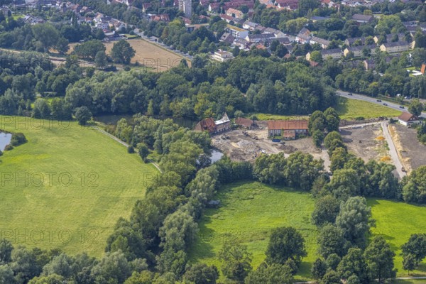Aerial view, construction site and renovation of the Schlossmühle am Mühlengraben am Mühlenteich in the district of Heessen, Hamm, Ruhr area, North Rhine-Westphalia, Germany, construction work, construction area, building site, building plots, construction project, construction site, DE, Europe, aerial view, aerial photography, aerial photography, aerial photography, renovation, overview, bird's-eye view, overview