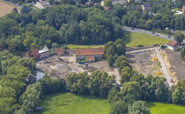 Aerial view, construction site and renovation of the Schlossmühle am Mühlengraben am Mühlenteich in the district of Heessen, Hamm, Ruhr area, North Rhine-Westphalia, Germany, construction work, construction area, building site, building plots, construction project, construction site, DE, Europe, aerial view, aerial photography, aerial photography, aerial photography, renovation, overview, bird's-eye view, overview