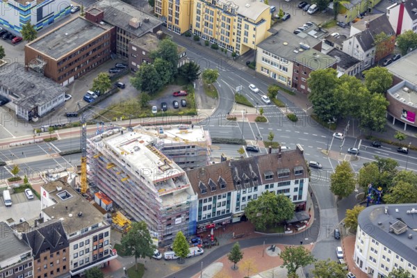 Aerial view, City Neue Bahnhofstraße corner Friedrichstraße with construction site and new residential building on the former site of the Kippââ'¬â¢n in the district Mitte in Hamm, Ruhr area, North Rhine-Westphalia, Germany, construction work, construction area, construction site, building plots, construction project, construction site, DE, Europe, property tax, Hamm, real estate, aerial view, aerial photography, aerial photography, new construction, overview, bird's eye view, residential complex, living and living, residential buildings, birds-eyes view, overview, City Neue Bahnhofstraße corner Friedrichstraße with construction site and new residential building on the former site of the Kipp'™n in the Mitte district in Hamm