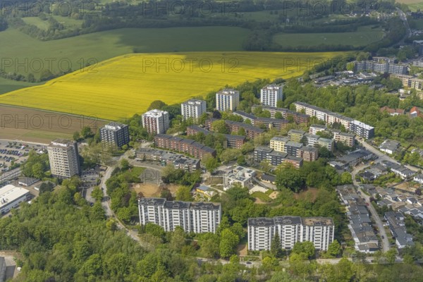 Aerial view, residential area and high-rise buildings Rhönstraße, district and development centre Oberilp, Heiligenhaus, Ruhr area, North Rhine-Westphalia, Germany, DE, Europe, property tax, high-rise buildings, real estate, aerial view, aerial photography, aerial photography, photovoltaics, photovoltaic system, rape field, solar, solar system, solar energy, solar energy, overview, bird's-eye view, residential complex, living and life, residential area, residential buildings, residential quality, residential quarter, housing estate, birds-eyes view, overview