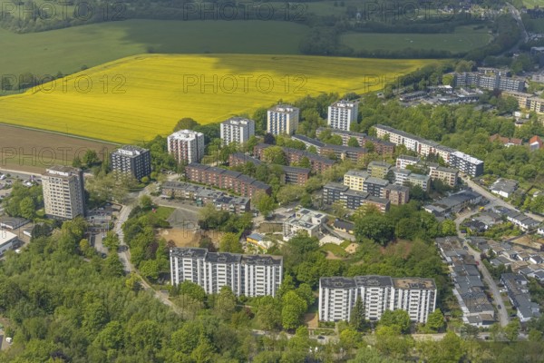 Aerial view, residential area and high-rise buildings Rhönstraße, district and development centre Oberilp, Heiligenhaus, Ruhr area, North Rhine-Westphalia, Germany, DE, Europe, property tax, high-rise buildings, real estate, aerial view, aerial photography, aerial photography, photovoltaics, photovoltaic system, rape field, solar, solar system, solar energy, solar energy, overview, bird's-eye view, residential complex, living and life, residential area, residential buildings, residential quality, residential quarter, housing estate, birds-eyes view, overview