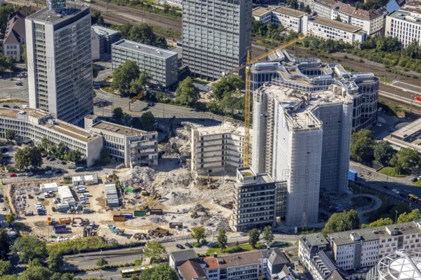 Aerial view, demolition Ypsilon-Haus of RWE headquarters Essen in the Huyssenallee, planned new building for office campus in the southern district in Essen, Ruhr area, North Rhine-Westphalia, Germany, demolition work, construction work, construction area, construction site, building plots, construction project, construction site, office complex, DE, energy company, Essen, Europe, aerial view, aerial photography, aerial photography, overview, bird's eye view, Ypsilon-Haus, birds-eyes view, overview