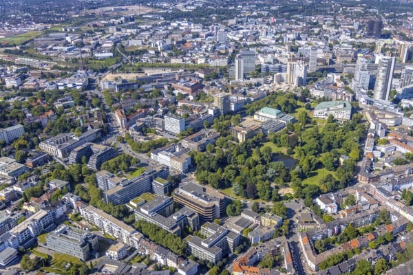 Aerial view, city centre view Essen with demolition Ypsilon-Haus of RWE headquarters Essen and city garden with Philharmonie Essen in the southern district in Essen, Ruhr area, North Rhine-Westphalia, Germany, City, DE, Essen, Europe, property tax, real estate, city centre, aerial view, aerial photography, aerial photography, townscape, city area, city centre, overview, bird's eye view, woodland, residential area, living and life, residential area, residential buildings, residential quality, housing estate, birds-eyes view, overview