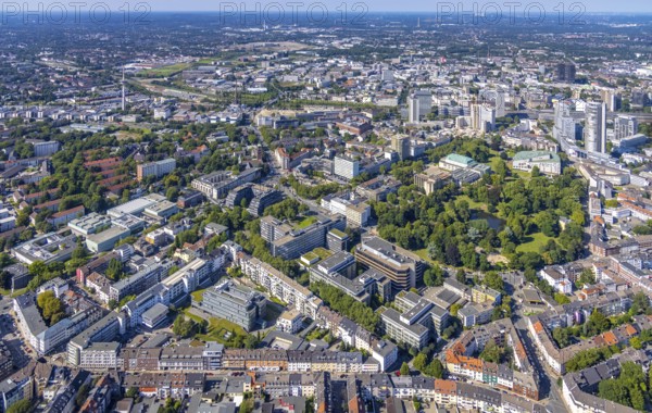 Aerial view, city centre view Essen with demolition Ypsilon-Haus of RWE headquarters Essen and city garden with Philharmonie Essen in the southern district in Essen, Ruhr area, North Rhine-Westphalia, Germany, City, DE, Essen, Europe, property tax, real estate, city centre, aerial view, aerial photography, aerial photography, townscape, city area, city centre, overview, bird's eye view, woodland, residential area, living and life, residential area, residential buildings, residential quality, housing estate, birds-eyes view, overview