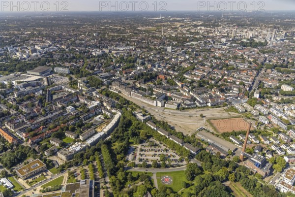 Aerial view, city centre view, Grugaplatz and Grugaweg with bridge Rüttenscheider Straße, fabric market on the fairground car park in Essen-Rüttenscheid, Essen, Ruhr area, North Rhine-Westphalia, Germany, DE, Europe, Giradetstraße, aerial view, aerial photography, aerial photography, car parks, overview, bird's-eye view, overview