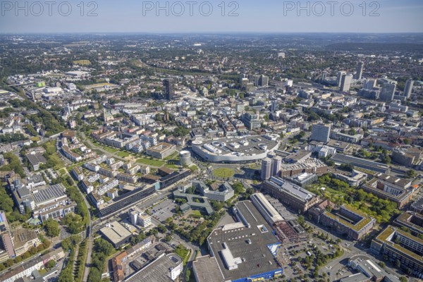 Aerial view, townscape city with Limbecker Platz and Funke Media Group as well as Essen Employment Agency and residential area Grüne Mitte in the city centre in Essen, Ruhr area, North Rhine-Westphalia, Germany, City, DE, Essen, Europe, property tax, real estate, city centre, aerial view, aerial photography, aerial photography, townscape, Radschnellweg Ruhr RS1, townscape, city area, city centre, overview, university quarter, bird's-eye view, residential area, housing and living, residential area, residential buildings, residential quality, residential quarter, housing estate, newspaper publisher, birds-eyes view, overview