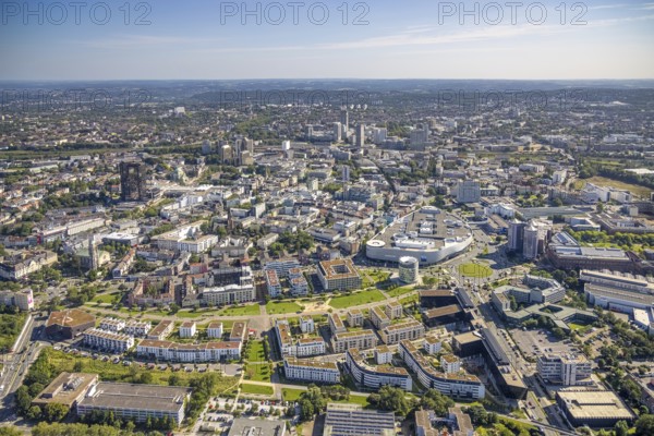 Aerial view, townscape city with Limbecker Platz and Funke Media Group as well as Essen Employment Agency and residential area Grüne Mitte in the city centre in Essen, Ruhr area, North Rhine-Westphalia, Germany, City, DE, Essen, Europe, property tax, real estate, city centre, aerial view, aerial photography, aerial photography, townscape, Radschnellweg Ruhr RS1, townscape, city area, city centre, overview, university quarter, bird's-eye view, residential area, housing and living, residential area, residential buildings, residential quality, residential quarter, housing estate, newspaper publisher, birds-eyes view, overview