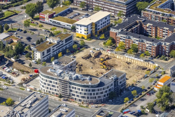 Aerial view, construction site project Neue Weststadt with new building office complex Frohnhauser Straße in the Westviertel in Essen, Ruhr area, North Rhine-Westphalia, Germany, construction work, construction area, building site, building plots, construction measure, construction project, construction site, DE, Essen, Europe, commercial enterprises, commercial area, commercial location, commercial use, aerial view, aerial photography, aerial photography, new building, overview, bird's-eye view, overview