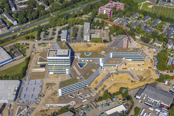 Aerial view, construction site and new construction ALDI-Nord Campus on the A40 motorway, Am Luftschacht in Essen-Kray in Essen, Ruhr area, North Rhine-Westphalia, Germany, construction work, construction area, building site, building plots, construction crane, construction project, construction site, DE, development, Essen, Europe, commercial enterprises, commercial area, commercial park, commercial site, commercial use, industrial site, capacity requirement, aerial view, aerial photography, aerial photography, new construction, overview, bird's-eye view, overview